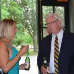 Two people talking to one another at an event