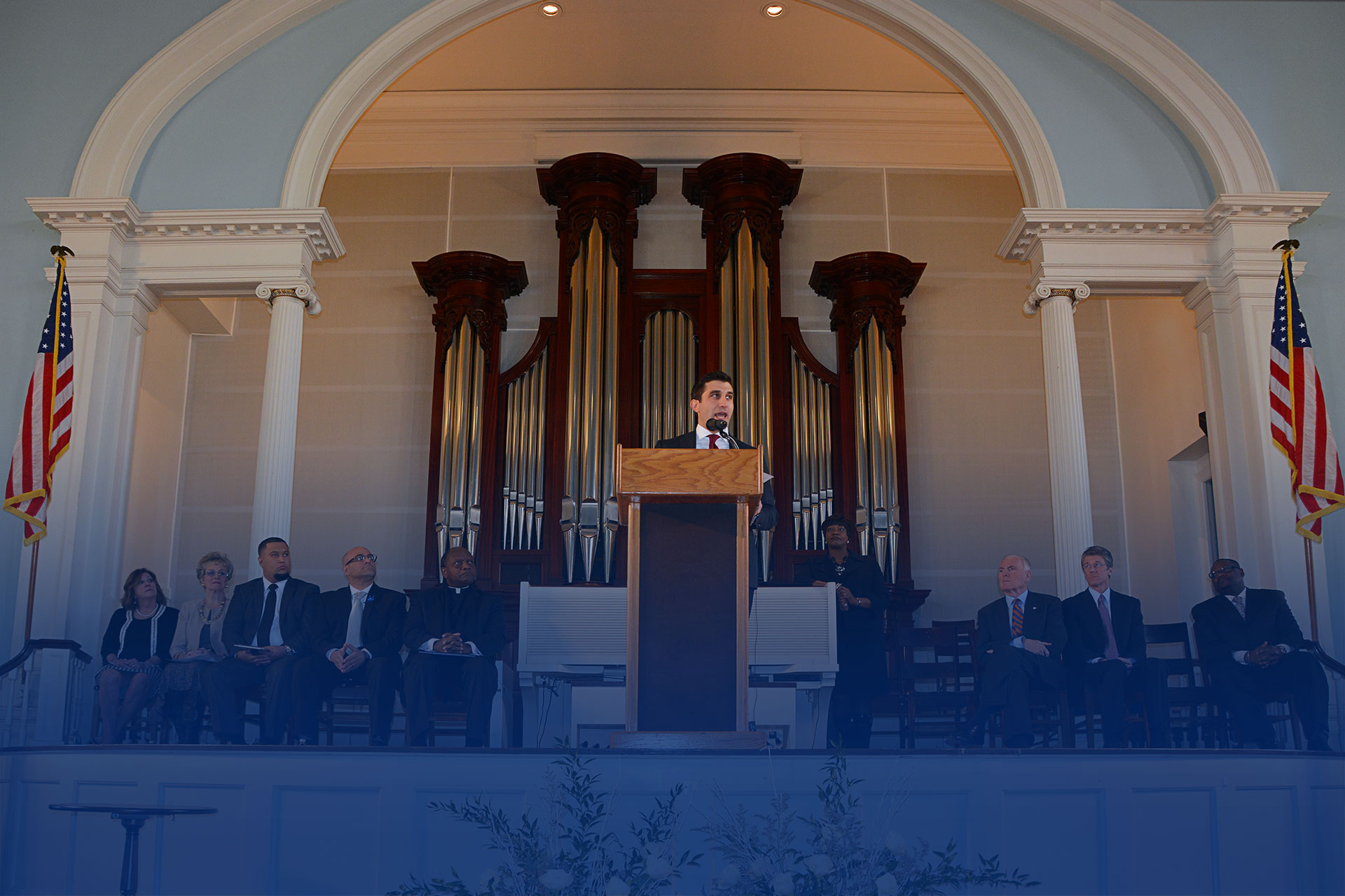 Hampden District Attorney Anthony Gulluni speaking at a podium