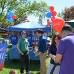 Hampden District Attorney Anthony Gulluni talks to a person at a campaign event.