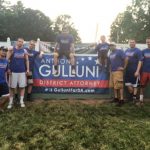 Hampden District Attorney Anthony Gulluni poses for a photo with eight others.