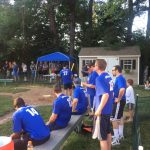 A team at a wiffle ball tournament wearing t-shirts supporting Hampden District Attorney Anthony Gulluni.