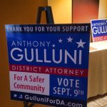 A sign supporting Hampden District Attorney Anthony Gulluni's campaign.