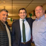 Hampden District Attorney Anthony Gulluni poses for a photo with two other people.