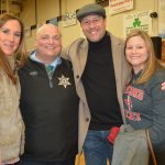 Hampden County Sheriff Nicholas Cocchi poses for a photo with three other people.
