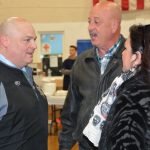 Hampden County Sheriff Nicholas Cocchi talks to two others.