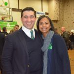 Hampden District Attorney Anthony Gulluni poses for a photo with another person.
