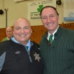 Hampden County Sheriff Nicholas Cocchi poses for a photo with a person.