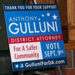 A sign in support of Hampden District Attorney Anthony Gulluni's campaign.