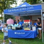 A Peoples Bank tent at an outdoor event.