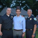 Hampden District Attorney Anthony Gulluni and two first responders pose for a photo.