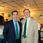Hampden District Attorney Anthony Gulluni poses for a photo with a man.