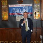 A man speaks at an event in support of Hampden District Attorney Anthony Gulluni's campaign.